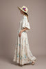 Ivory straw floppy hat with feather brooch