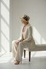 Ivory straw fedora hat with feather design