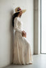 Ivory floppy straw sun hat with brooch accent