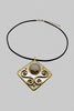 Mixed metal medallion necklace close up
