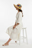 Feather brooch floppy fedora hat close up