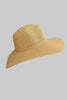 Floppy straw fedora hat styled