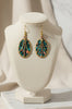 Bohemian oval metal speckled patina earrings