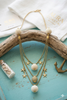 Handmade Sachi beaded raffia and wood necklace