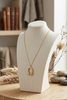 Gold-dipped crescent drop pendant necklace