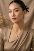 Gold shell and CZ butterfly pendant chain necklace, styled view