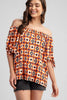 Bold geometric off-the-shoulder top front view
