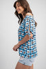 Geometric print off-shoulder blouse detail