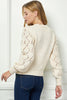 Pointelle knit pullover sweater close up