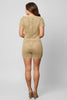 Gold knit romper styled