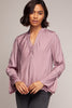 Surplice neckline twisted front blouse styled