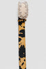Cow print faux leather belt side view