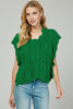 Cable knit vest with side knot detail close up