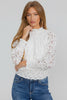 Lace mock neck blouse styled