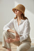 Ivory straw bucket hat with scalloped crochet edges