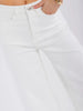 Wide-leg jeans with button pockets and raw hem