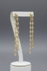 Gold dipped CZ chain dangle earrings, front view