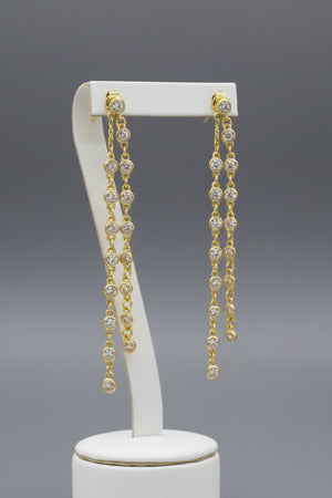 Gold dipped CZ chain dangle earrings, front view