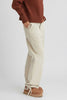 Khaki washed parachute pants close up