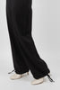 Cinched hem parachute pants detail shot