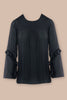 Smocked yoke ruffled blouse styled