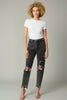 Black button closure distress washed denim pants, front view