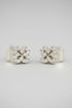 Gold mini CZ clover stud earrings side view