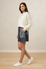 Dark denim elastic waist shorts, side view