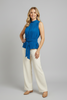 Mock neck top with front drape detail styled