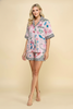 Pink pajama set with leopard trim