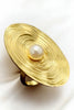 Geometric pearl on disc ring in gold