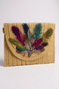 Hand designed straw crossbody clutch with feathers