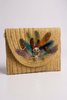 Feathered straw envelope clutch detail