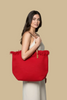 Red braided canvas tote bag, lifestyle carry view