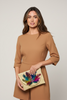 Straw envelope clutch with ocean crystal brooches