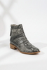 Snake print pointy toe ankle boot
