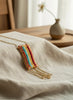 Warp weft striped necklace close up