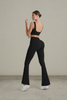 Two-piece sports bra and flare legging activewear set, close-up