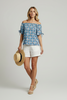 Bold geometric off-shoulder top product shot