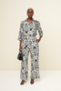 Black white botanical wide-leg two-piece set, side view