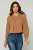 Mocha muse smock top with intricate smocking detail, styled