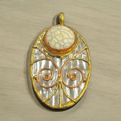 Stainless Steel pendant with brass/copper