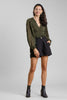 Pleated wide-leg shorts with button-zip front, front view