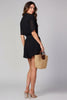 Half-button knit romper in polyester-cotton, side view