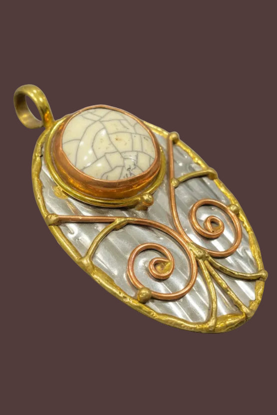 Stainless Steel pendant with brass/copper