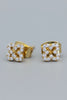 Gold clover stud earrings with CZ detail