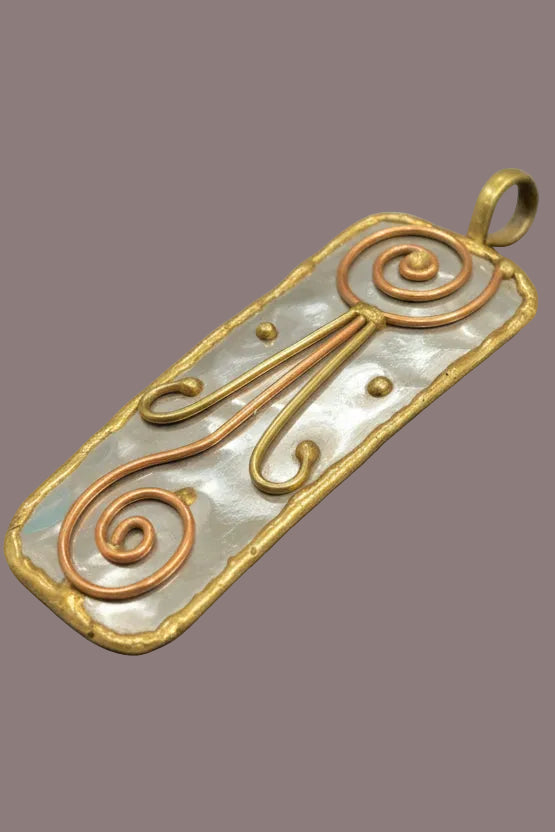 Stainless Steel pendant with brass/copper