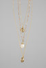 Gold sea shells layered necklace side view