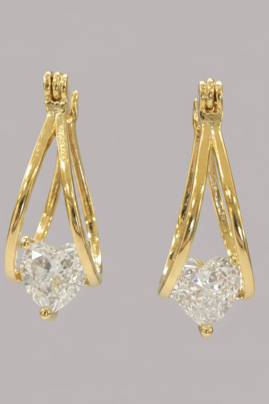 Golden hearthfall teardrop rhinestone earrings, on ear
