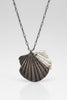 Antique shell necklace flat lay